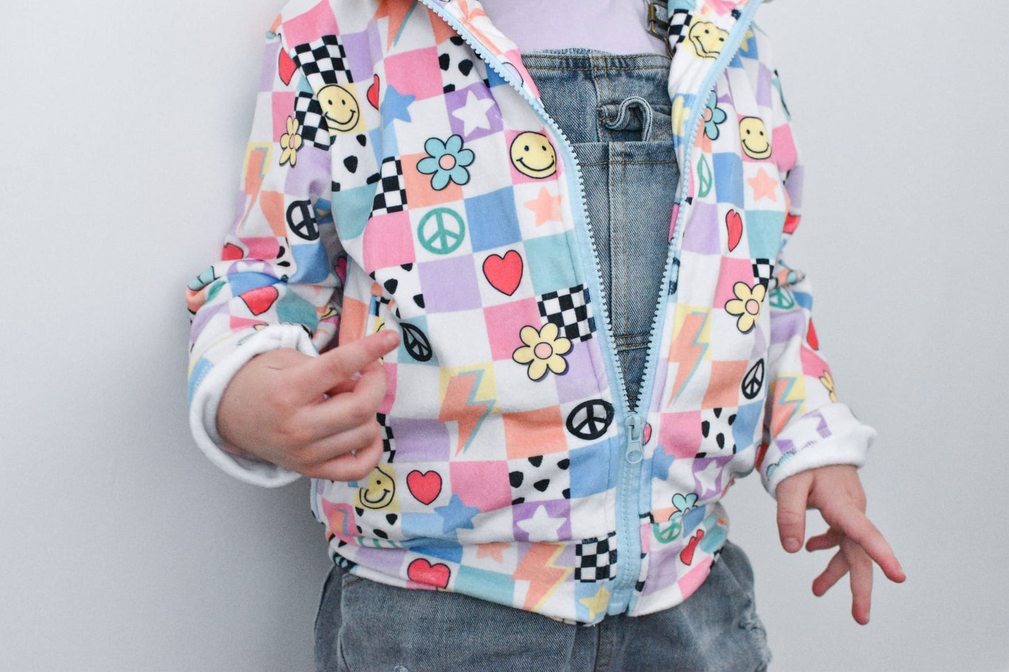 Y2K Pastel Patchwork Fleece Jacket for Kids – Smiley Face, Peace Sign & Heart Print, Groovy Check