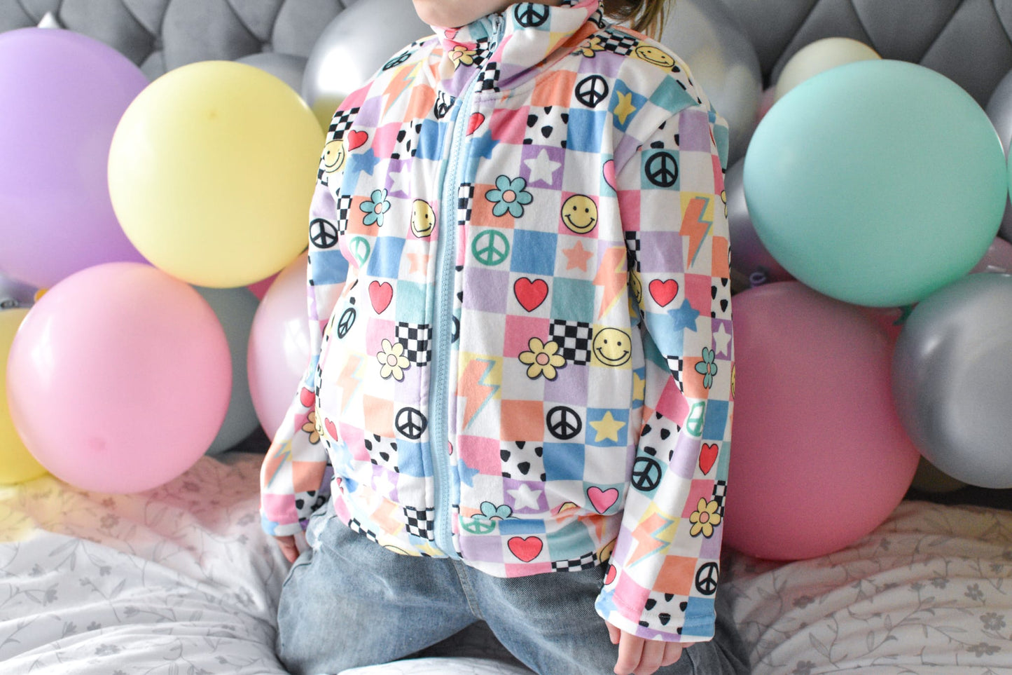 Y2K Pastel Patchwork Fleece Jacket for Kids – Smiley Face, Peace Sign & Heart Print, Groovy Check