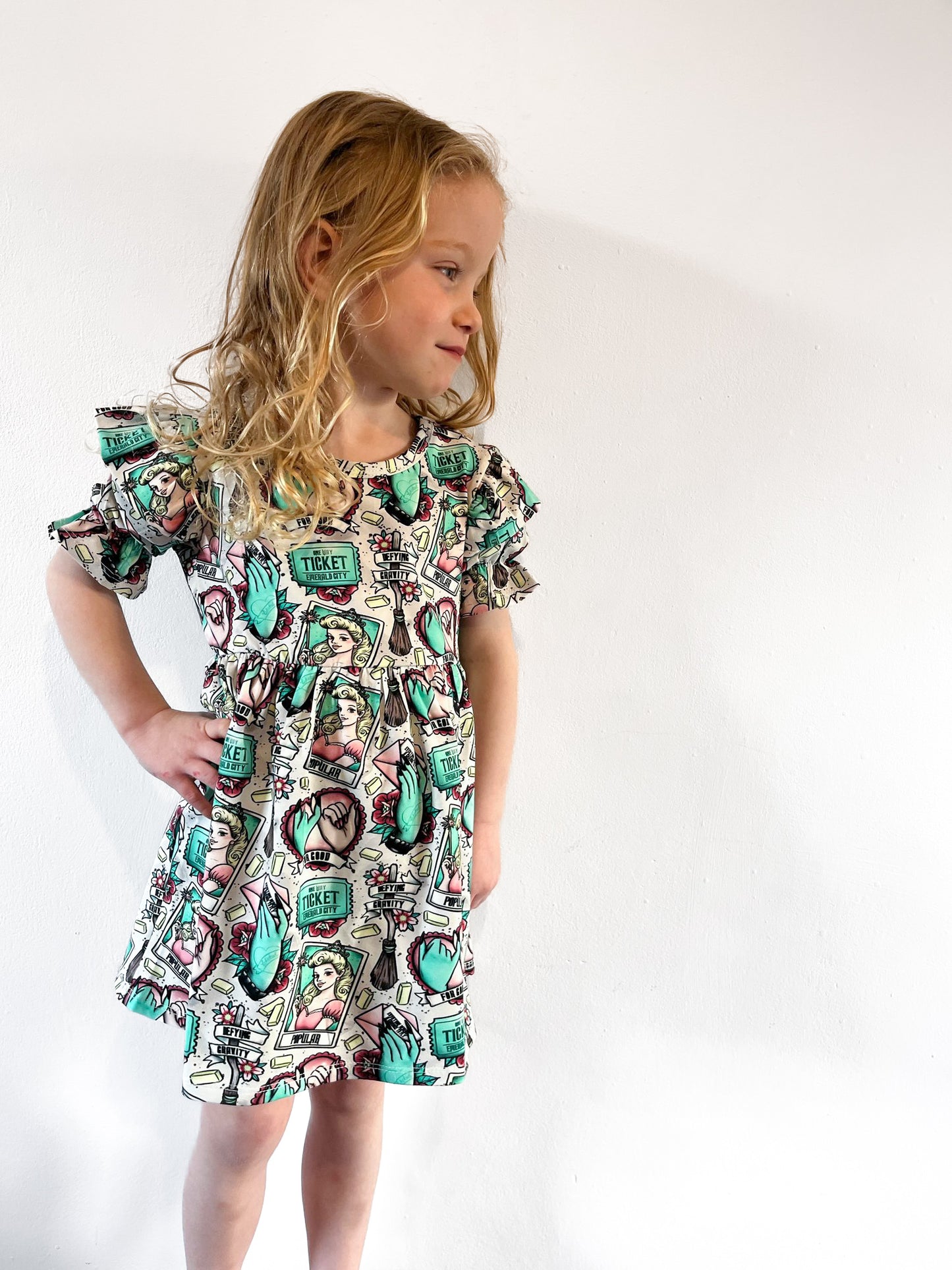 Pre Made Emerald City Short Sleeve Ruffle Dresses – Bold, Bright & Brilliantly Brave!