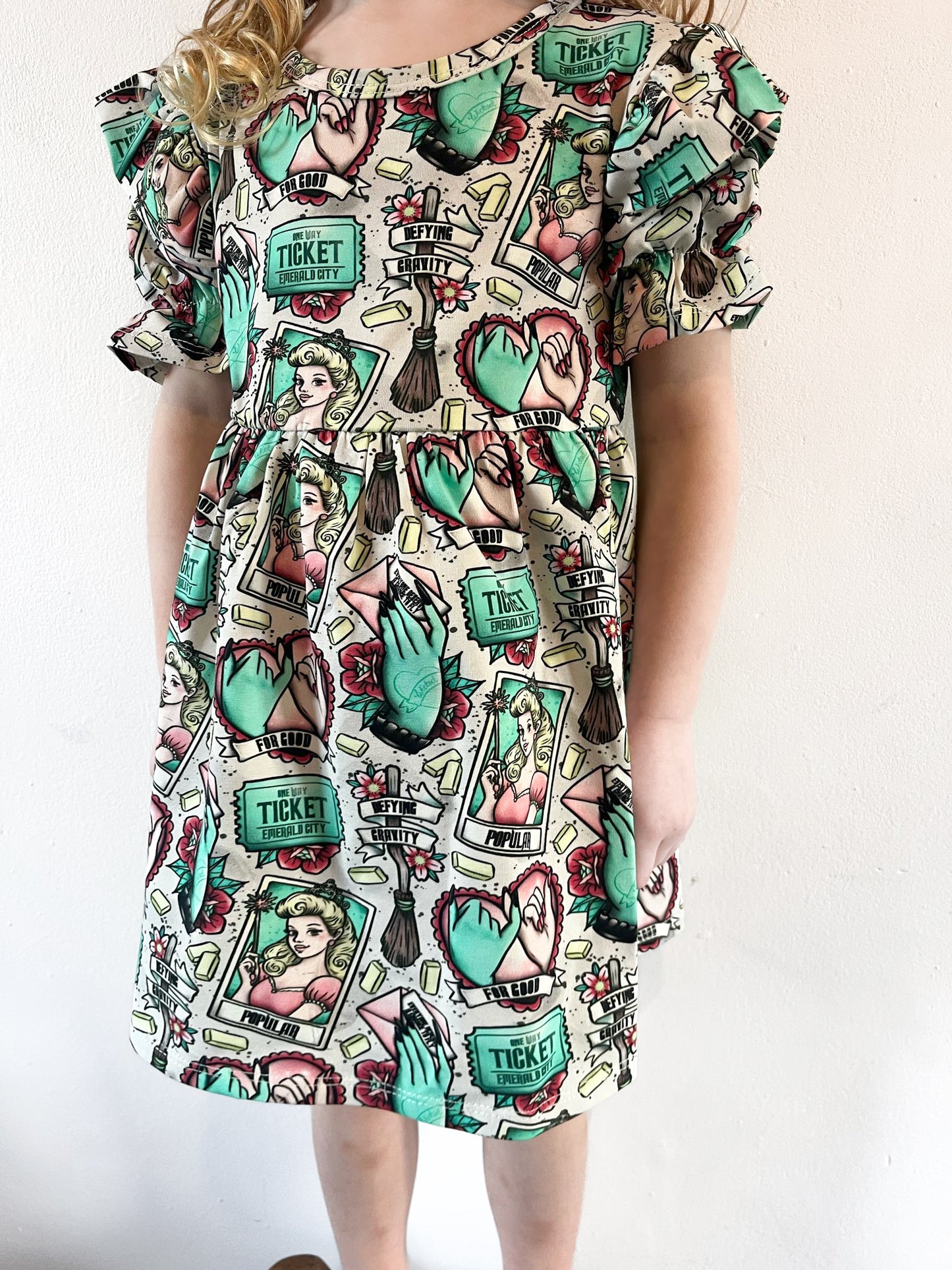 Pre Made Emerald City Short Sleeve Ruffle Dresses – Bold, Bright & Brilliantly Brave!