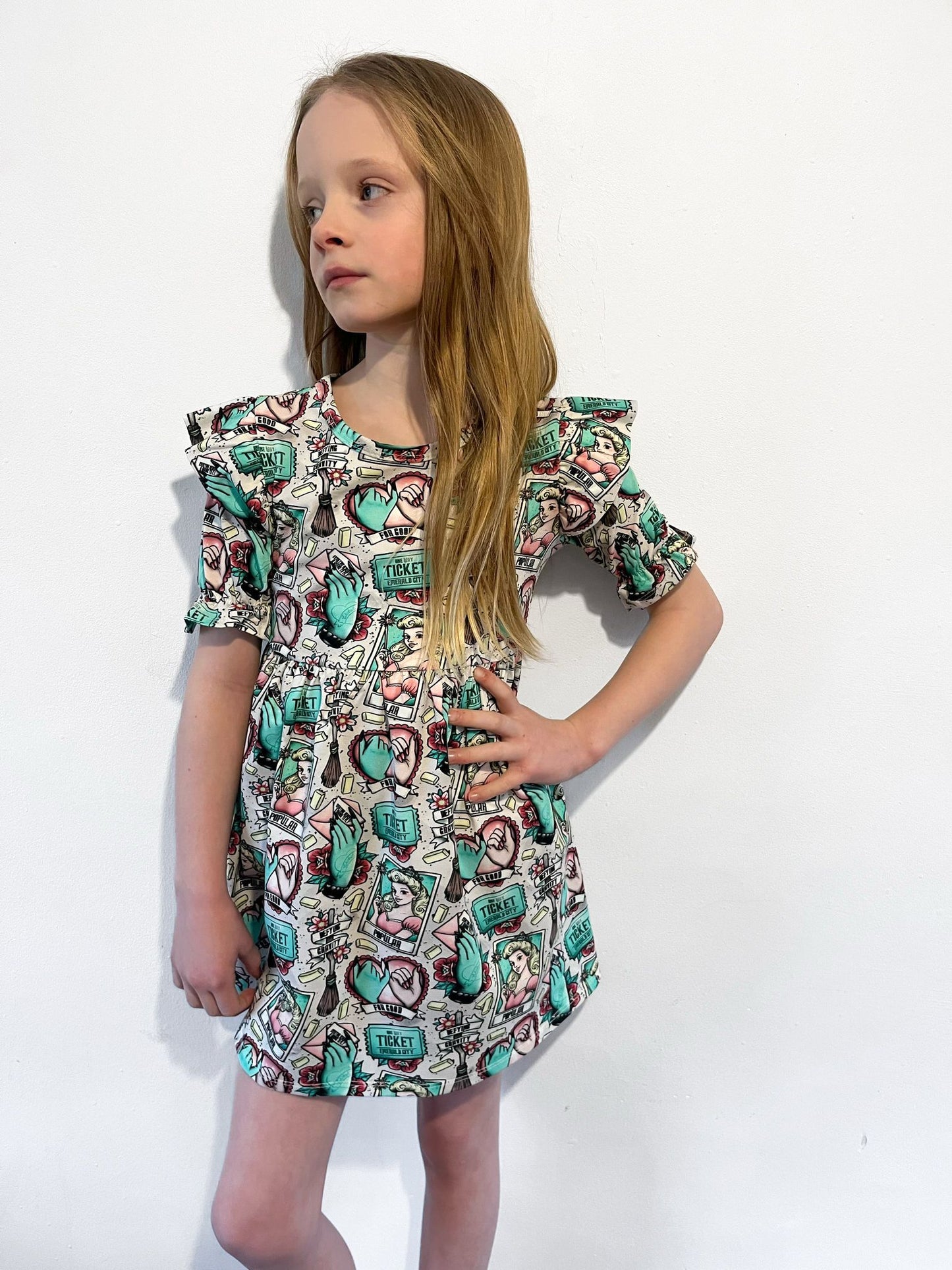 Pre Made Emerald City Short Sleeve Ruffle Dresses – Bold, Bright & Brilliantly Brave!